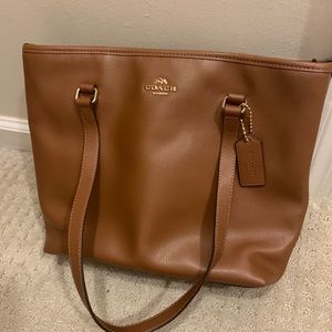 Medium size tan coach bag
